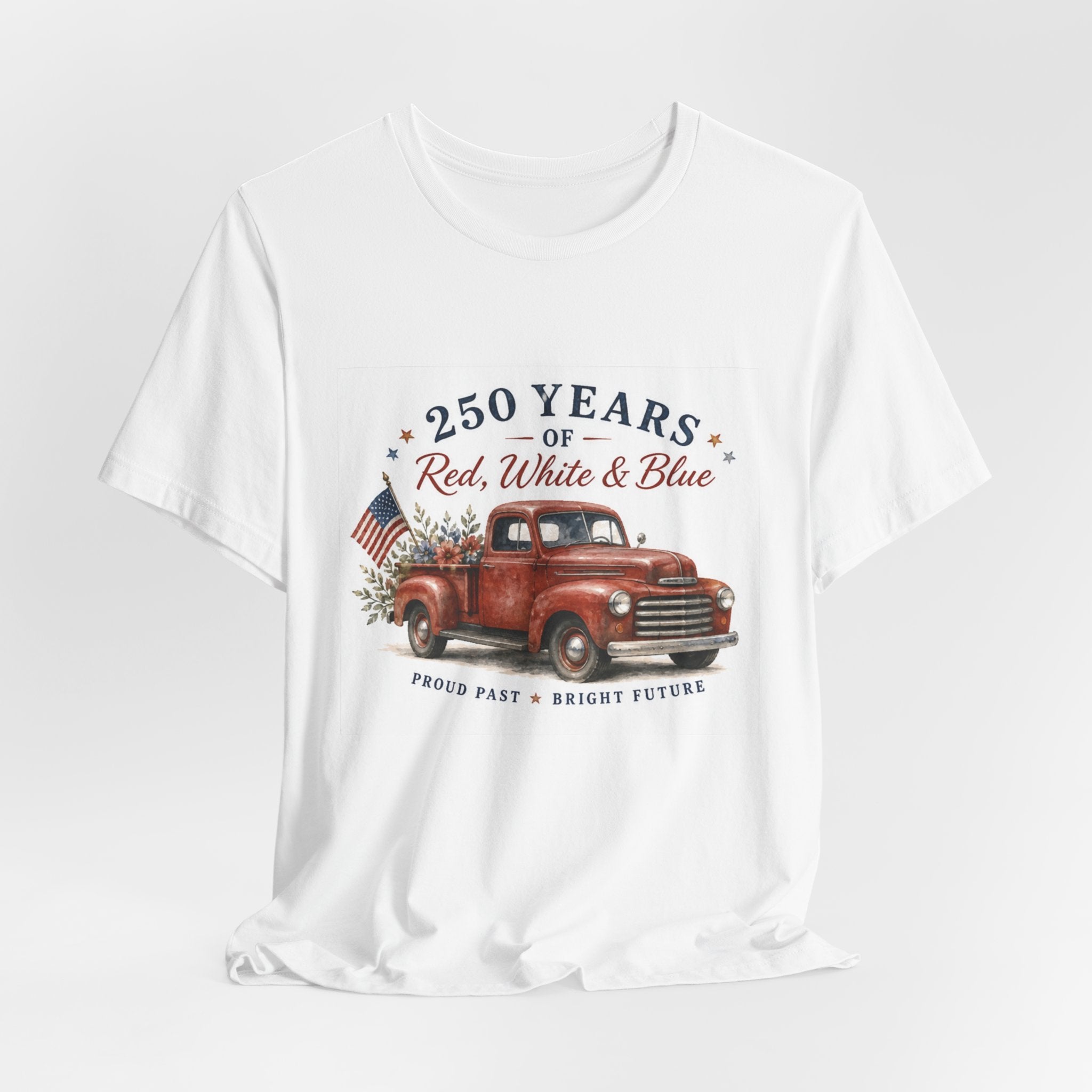 Red vintage truck with flowers and American flag, "250 Years of Red, White & Blue" text.