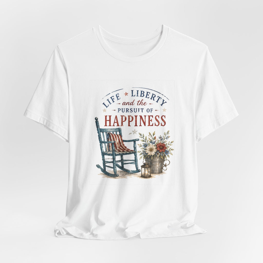 White t-shirt with rocking chair, flag, flowers, and lantern graphic.
